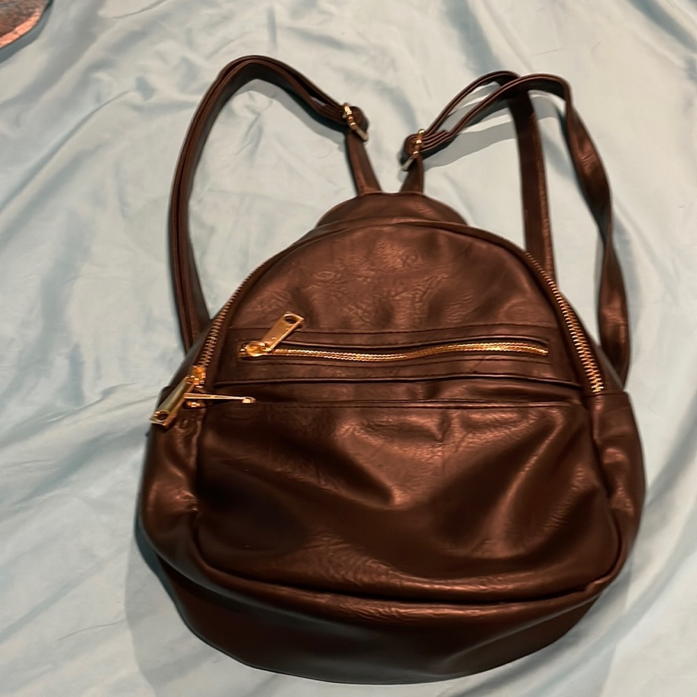 Bueno Black Leather Backpack with gold trim zipper & Adjustable Straps